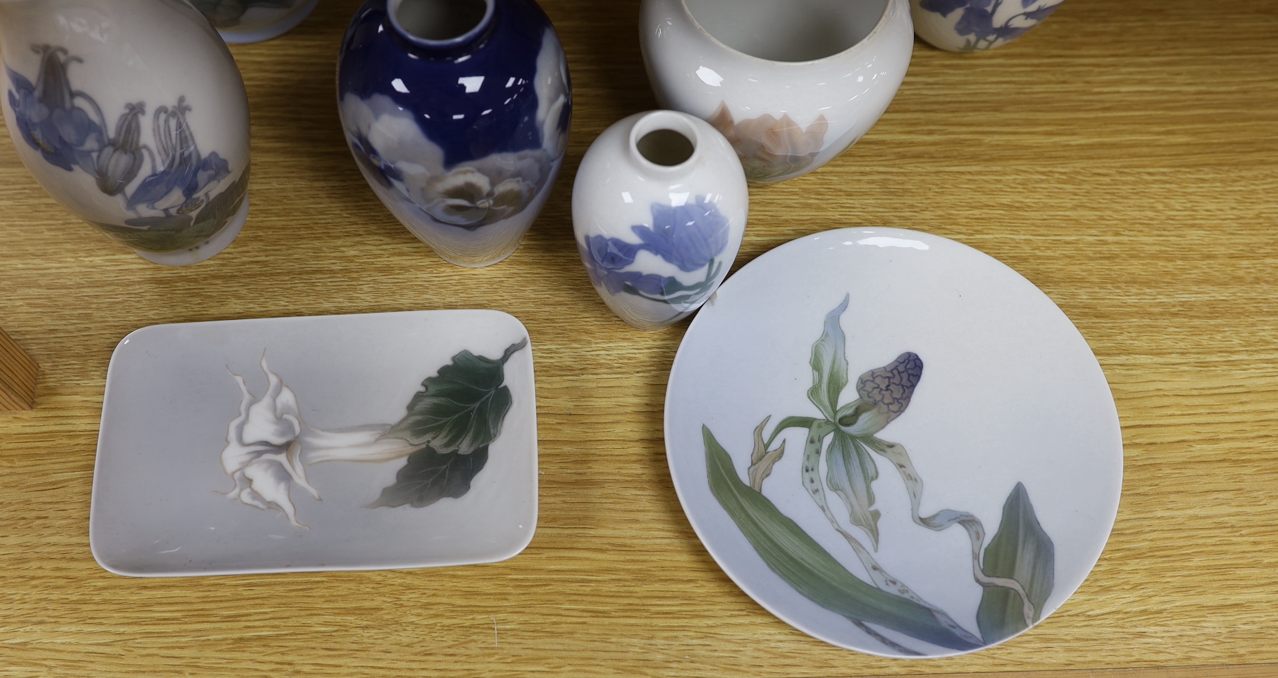 Six Royal Copenhagen vases and two plates including one B&G vase, all with floral decoration (9), tallest 21.5 cm high